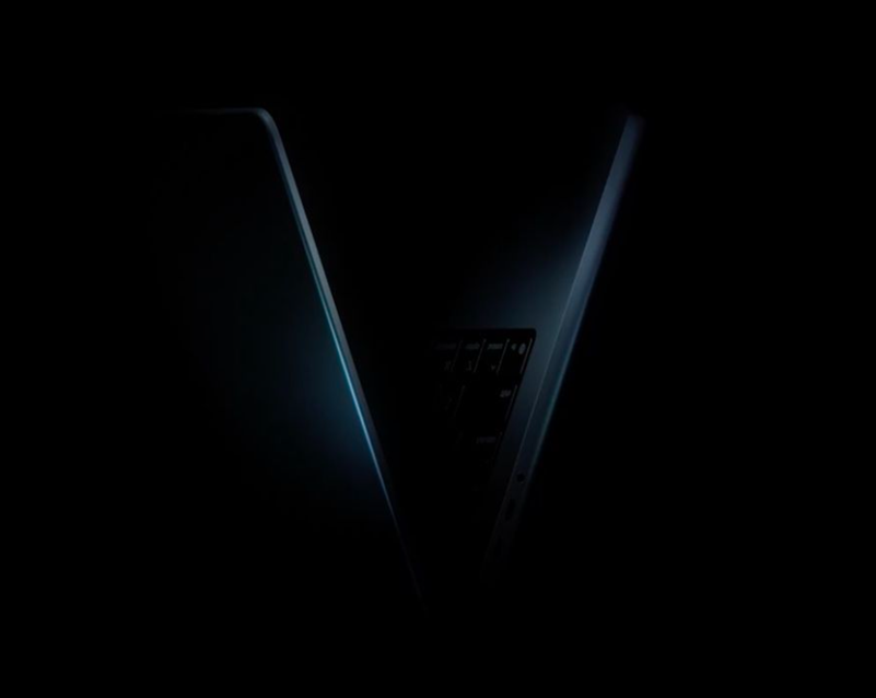  MacBook Pro in the teaser forms the letter “V.” (Image credit - Apple)